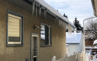 Ice dams on a calgary home, Yard Busters Landscaping