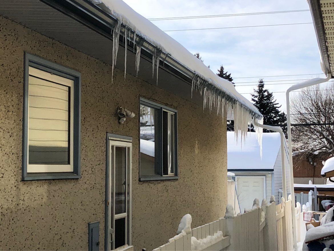 Ice dams on a calgary home, Yard Busters Landscaping