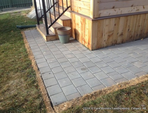 Before-and-after: Stone patio around an existing deck